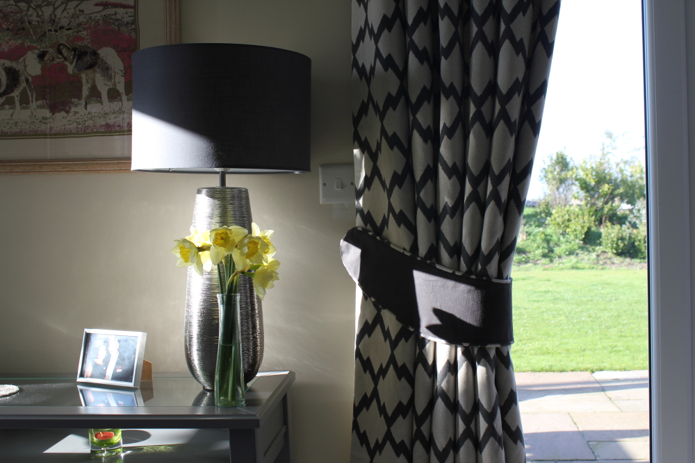 black eyelet curtains with tie sash